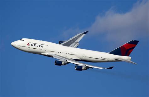 delta airlines aircraft on runway with strong brand presence