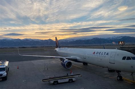 delta airlines at bozeman airport yellowstone ski travelers boarding in winter