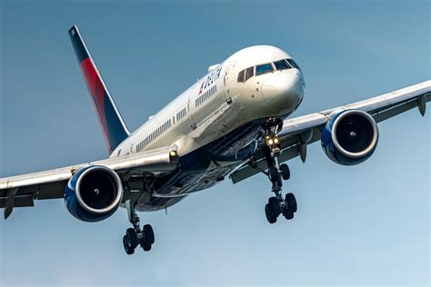 Delta Boeing 757 aircraft at airport terminal