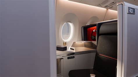 Delta One Suite cabin interior modern business class seat door lighting