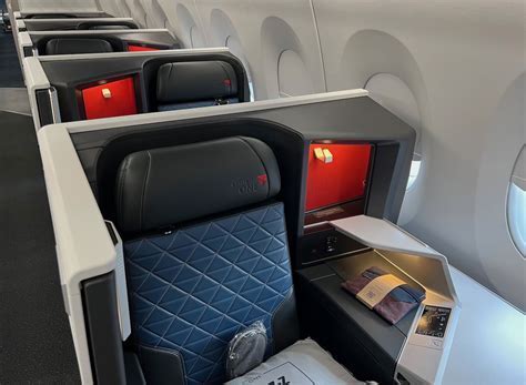 delta one suite vs older delta business class seat side by side