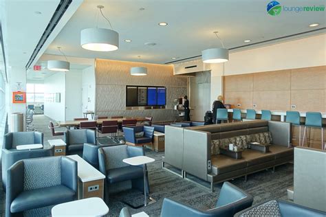 Delta Sky Club at JFK Terminal 4 bar area with NYC-inspired design