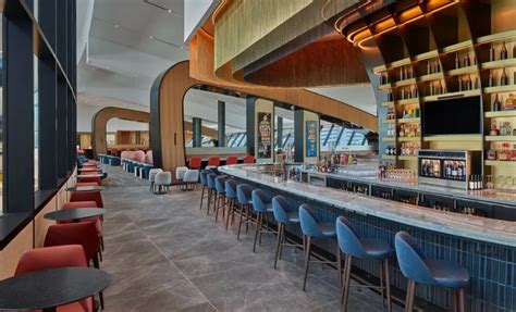 Delta Sky Club Los Angeles terrace seating with runway views