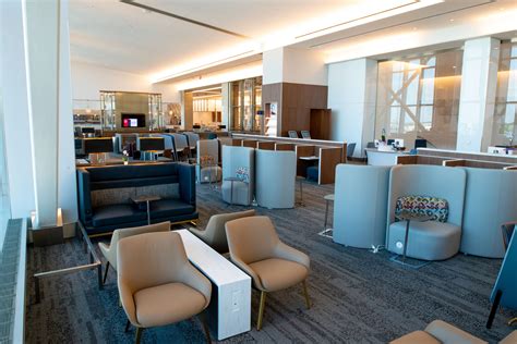 Delta Sky Club lounge seating area with runway views