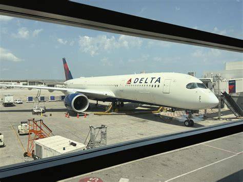 Delta SkyMiles premium traveler boarding Airbus A350 for Mediterranean flight