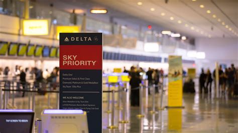 Delta SkyPriority check-in counter premium passengers airport service