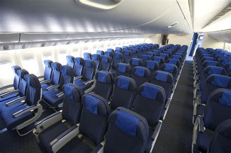 dense economy cabin with slimline seats on Boeing 777