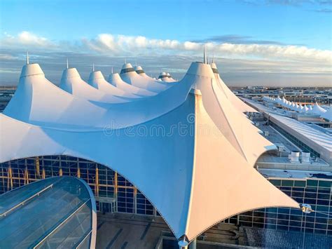Denver International Airport tents roof design with airplanes on runway