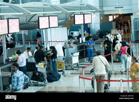 deserted check-in counters at Sharjah airport during Middle East aviation crisis