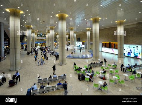 deserted check-in counters at Tel Aviv’s Ben Gurion Airport as international flights halt