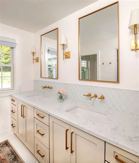designer hotel bathroom with double sinks and limited counter space