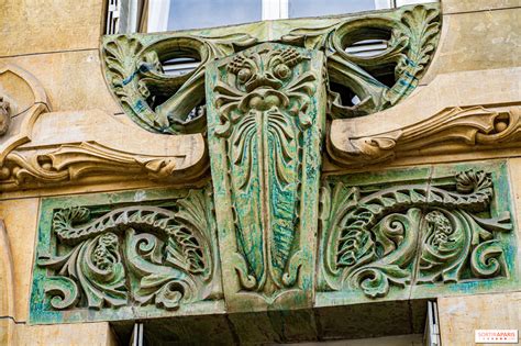 detail of art nouveau facade with peacock on albert street