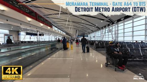 Detroit Metro McNamara Terminal elevated tram and Delta connecting passengers