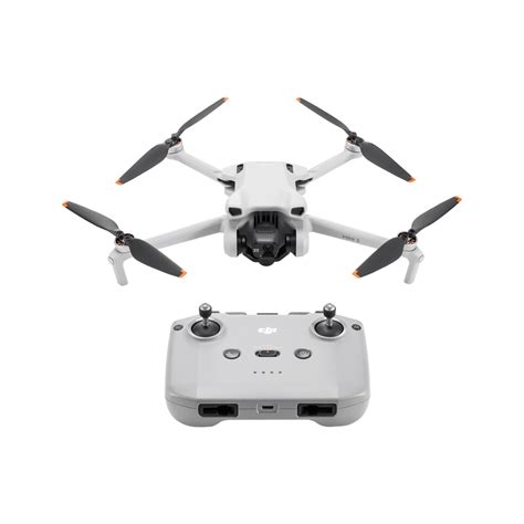 DJI Mini 3 post-flight with talon marks, set against forest clearing