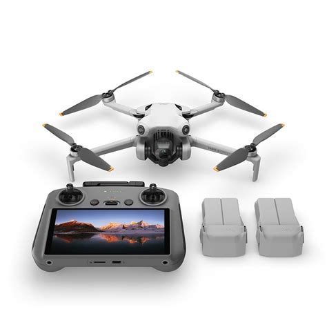 DJI Mini 4 Pro Fly More Combo contents laid out on table before first flight