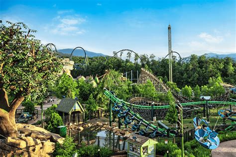 Dollywood amusement park with packed crowds and colorful attractions