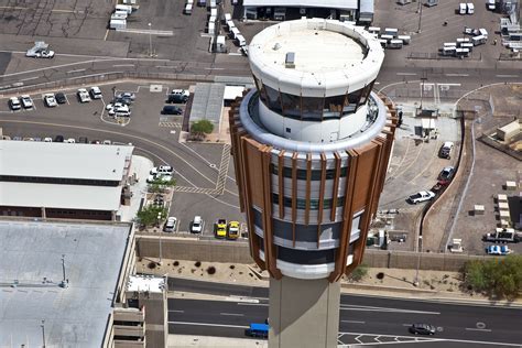 Dramatic sunset view over Phoenix Sky Harbor International Airport control tower