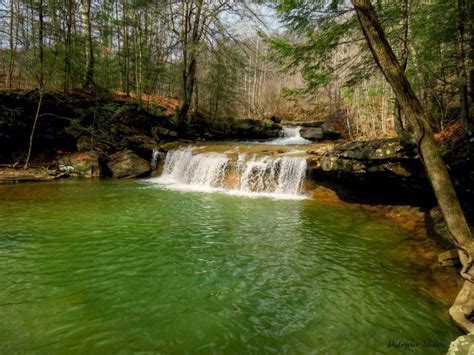 Drawdy Falls swing with cascading water backdrop