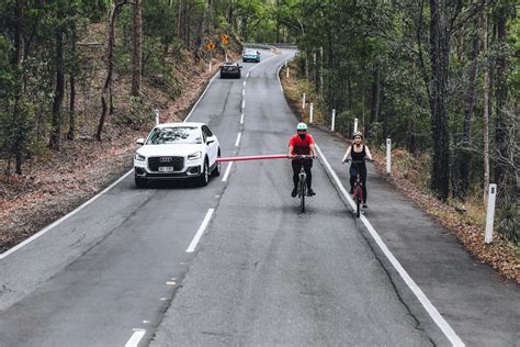 Drone actively using ‘Follow Me’ mode to track a cyclist on a trail
