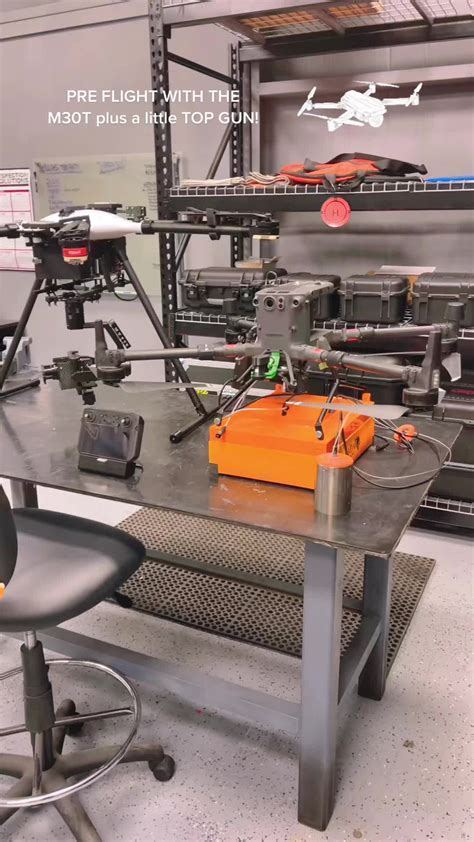 Drone pilot performing pre-flight checks on Matrice 30T
