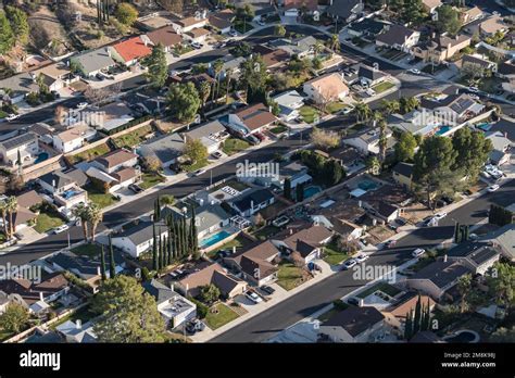 drone returning to home base over suburban neighborhood
