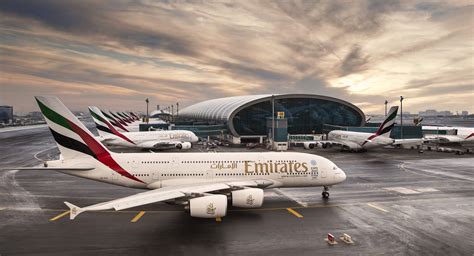 Dubai International Airport Emirates Airbus A380 lineup at terminal