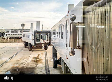 Dulles Airport mobile lounge passengers boarding between terminal and concourses
