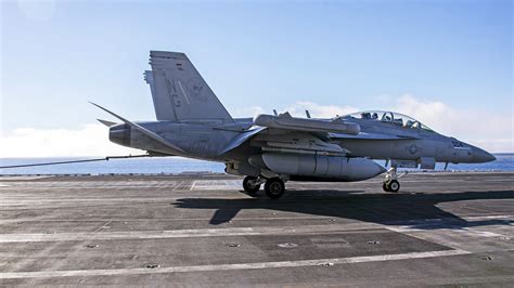 EA-18G Growler electronic attack jet with jamming pods at NAS Whidbey Island Ault Field