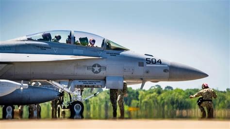 EA-18G Growler launching electronic countermeasure pod