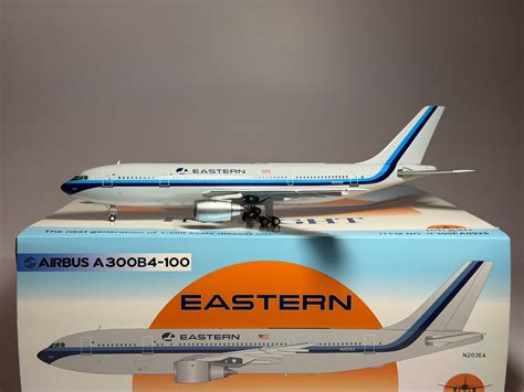 Eastern Air Lines Airbus A300 in white hockey stick livery at an airport gate