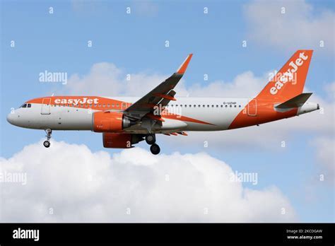 easyjet airbus a320neo on taxiway at sunset