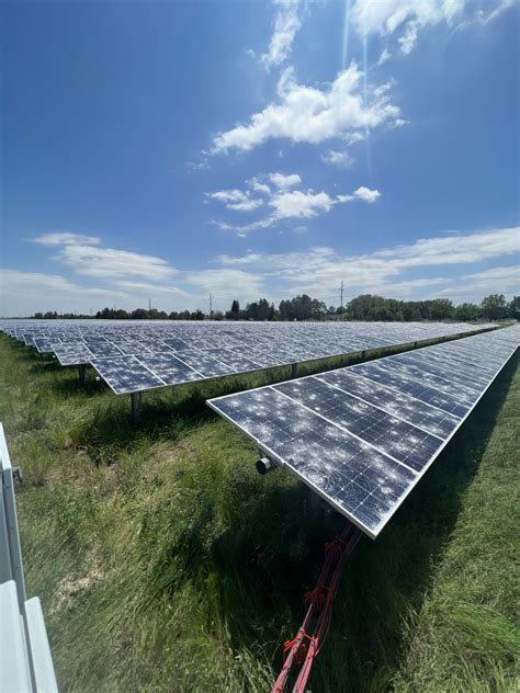 eco-friendly aircraft hangar using solar panels and sustainable lighting for MRO tasks