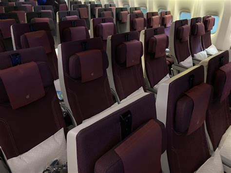 economy cabin view on Qatar Airways Boeing 777 flight to Doha