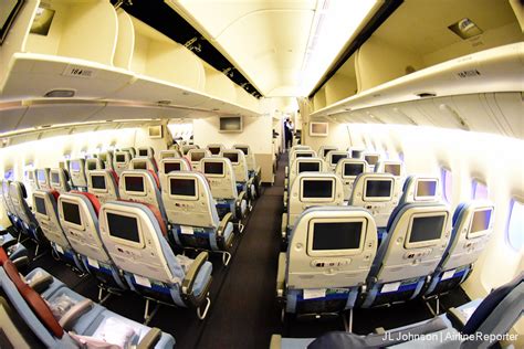 economy class airplane cabin transatlantic flight