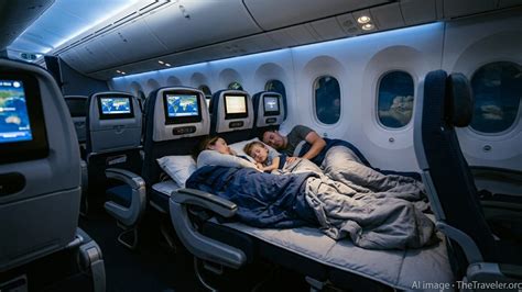 economy class cabin long haul passengers resting overnight flight