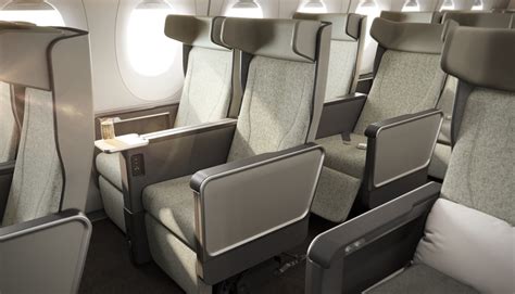 Economy class seating in Qantas A350-1000ULR showing extended legroom and in-flight lighting system
