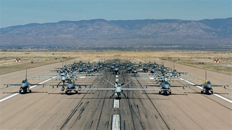 Edwards Air Force Base runway with experimental aircraft and Rogers Dry Lake
