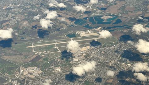 Eglin Air Force Base aerial view showcasing runways, test facilities, and aircraft