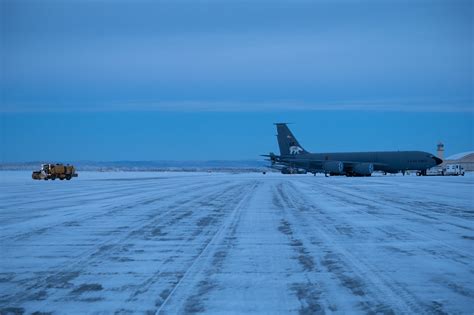 Eielson Air Force Base snow-covered runway with fighter jets in Arctic conditions