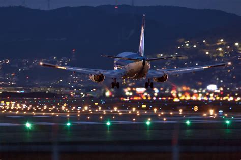 El Dorado Airport at night with city lights in background