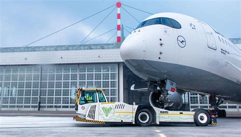 electric aircraft tug operating at regional terminal