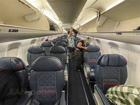 Embraer 175 regional jet economy cabin spacious seats