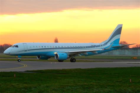 Embraer E190 customized private touring jet on airport apron