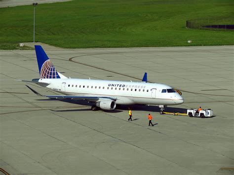 Embraer ERJ 175 departing from SFO under a winter sky