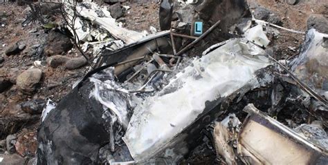 Emergency responders at crash site of 2012 Sedona Beechcraft Duke accident