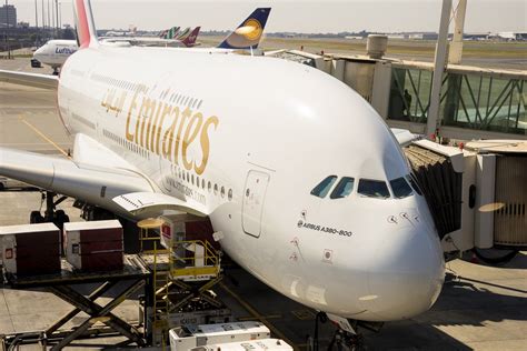 Emirates A380 at Dubai airport with Auckland route branding