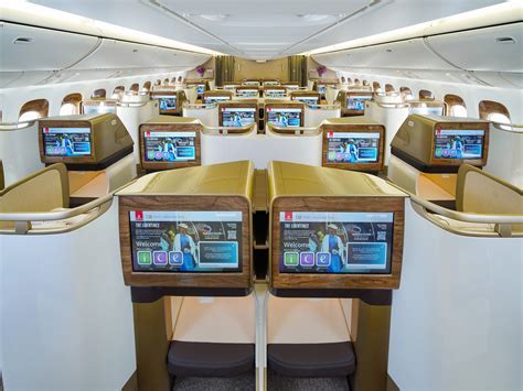 emirates a380 exterior during boarding with economy passengers entering cabin