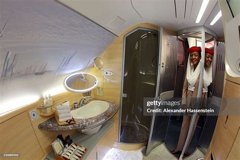 Emirates A380 first class shower spa with gold fixtures