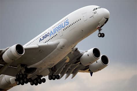Emirates A380 in flight showing operational superjumbo fleet
