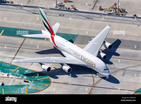 Emirates A380 Los Angeles departure sunset runway